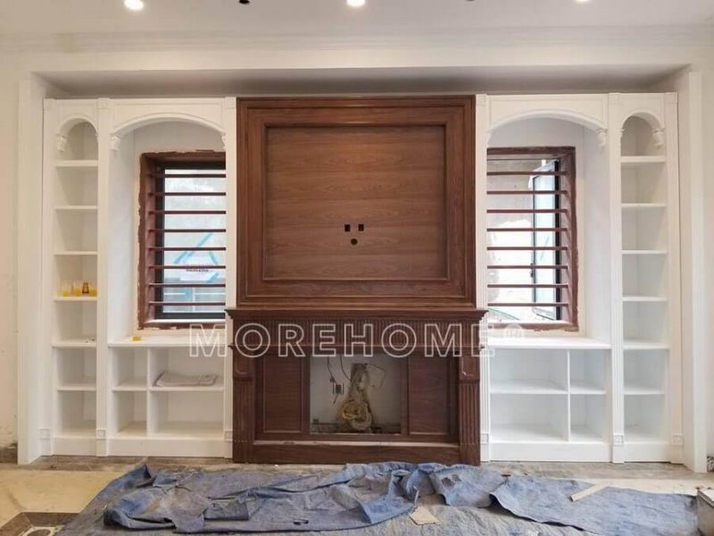 Để tăng thêm giá trị cho không gian sống, hãy hoàn thiện mẫu lò sưởi bằng gỗ óc chó cao cấp.